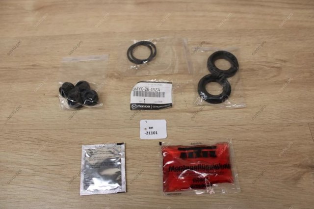 Zestaw naprawczy zacisku hamulcowego tylnego GMY02646ZA Mazda