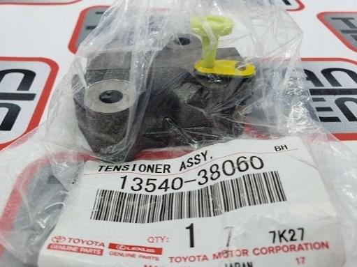 Napinacz łańcucha wałków rozrządu lewy 1354038060 Toyota