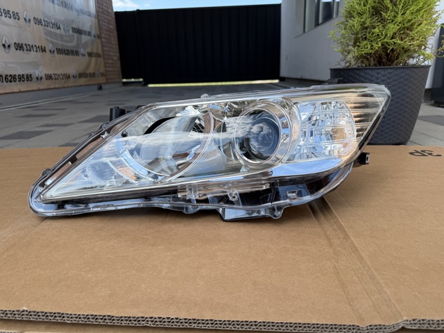 Do koszyka 81E2090E Polcar Reflektor lewy