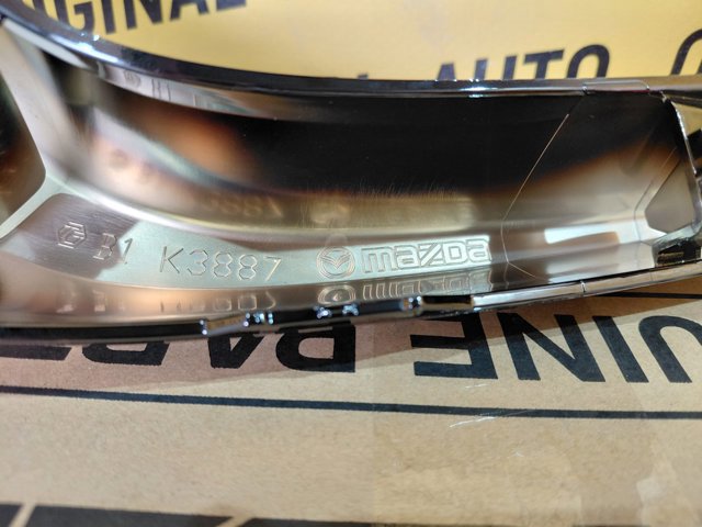 Listwa ochronna atrapy chłodnicy lewa Mazda KSD5507K0 cena, od 125,42 USD