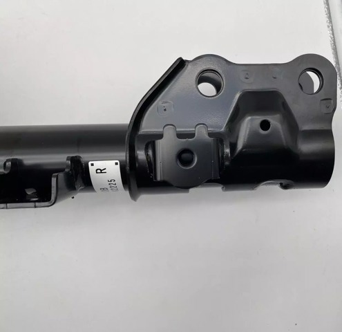 Amortyzator przedni prawy TK5034700B Mazda