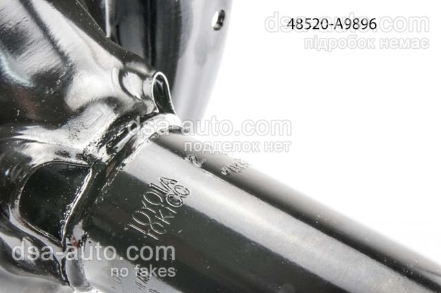 Do koszyka 48520A9896 Toyota Amortyzator przedni lewy