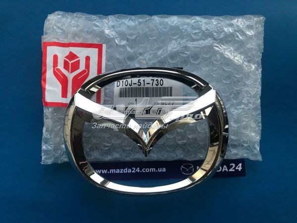 Emblemat na atrapę chłodnicy D10J51730 Mazda