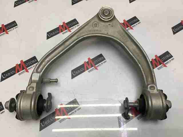 LR117884 Land Rover Wahacz zawieszenia przedniego prawy górny