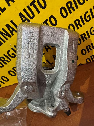 Zacisk hamulcowy tylny lewy Mazda CX-9 SUV (TC) (2016 - 2026) cena, od 15,29 USD