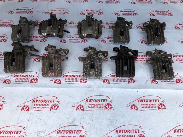 Zacisk hamulcowy tylny prawy 1J0615424F VAG