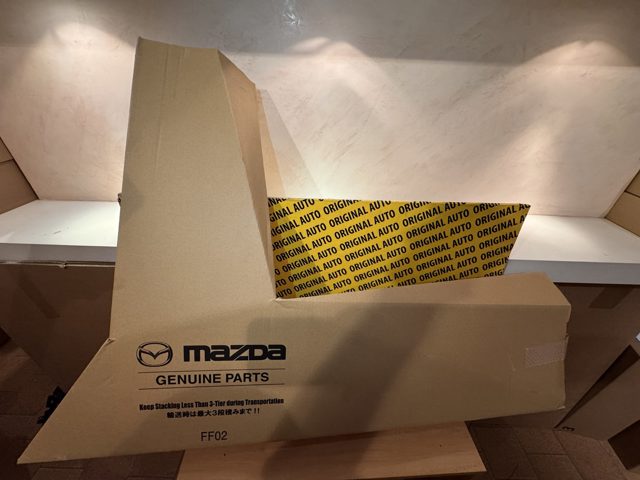 Do koszyka BCJH52210 Mazda Błotnik przedni lewy