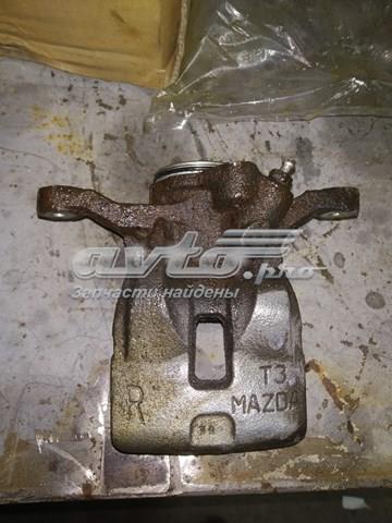 Zacisk hamulcowy tylny lewy Mazda KAY02671XA cena, od 173,66 USD