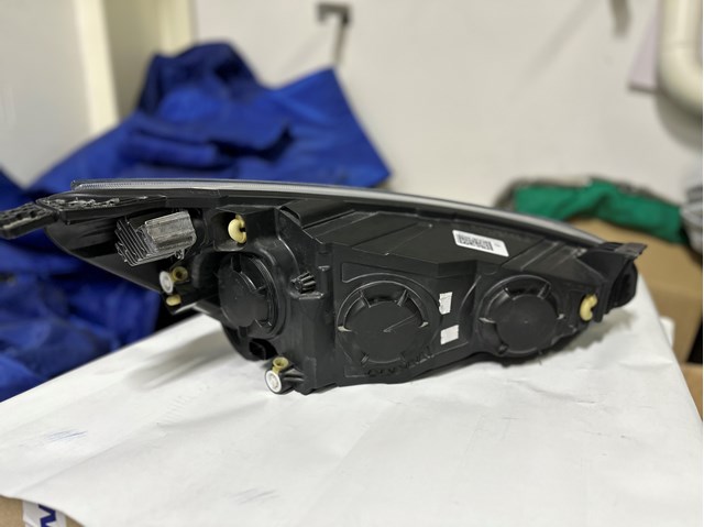 Reflektor lewy Ford Focus IV