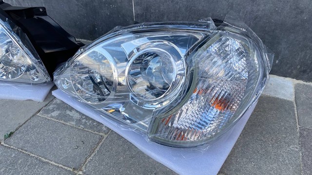 Do koszyka 92102H1010 Hyundai/Kia Reflektor prawy