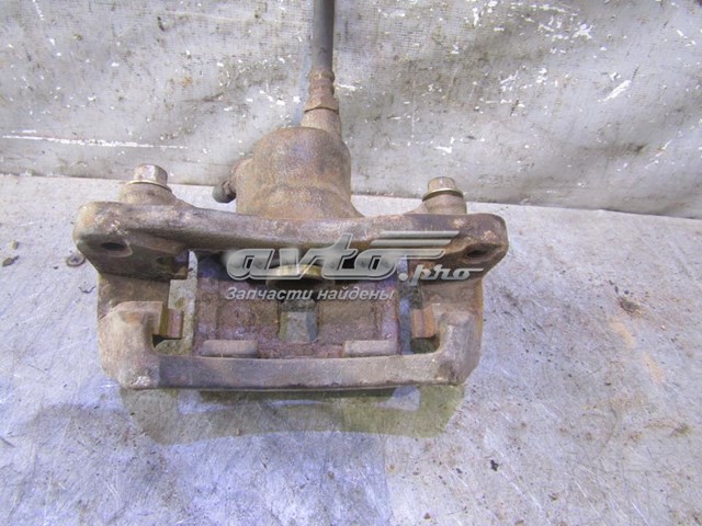 MB950195 Mitsubishi Zacisk hamulcowy tylny lewy