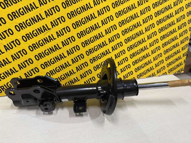 Do koszyka KB8M34900 Mazda Amortyzator przedni lewy