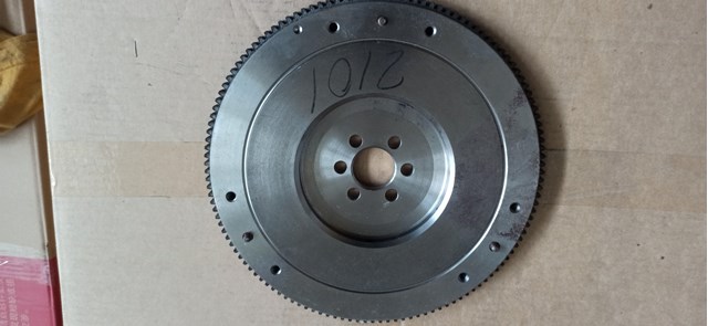 Do koszyka 21010100511500 Lada Koło zamachowe silnika