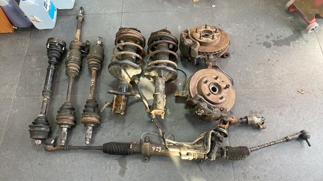 GA7V34900A Mazda Amortyzator przedni lewy
