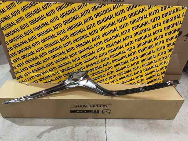 Listwa ochronna atrapy chłodnicy lewa Mazda GSH7507K0D cena, od 63,23 USD