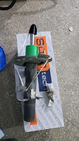 Amortyzator przedni lewy FV6Z18124C Ford