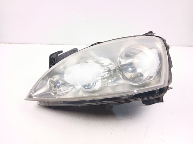 Reflektor lewy 13100535 Opel