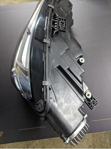 Reflektor lewy 8W0941035 VAG