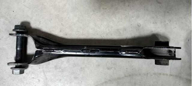 104442700C Tesla Wahacz (drążek) tylnego zawieszenia pozdłużny górny lewy /prawy