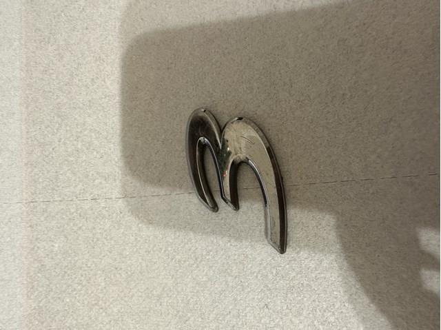 Do koszyka Emblemat na klapę bagaznika (znaczek firmowy) Mazda 3  BK12