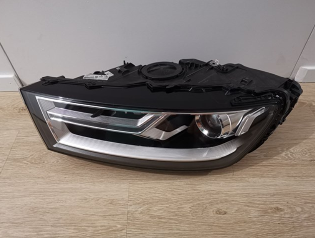 Reflektor lewy 4M0941005B VAG