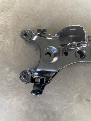 Do koszyka 554103K712 Hyundai/Kia Korpus osi tylnej