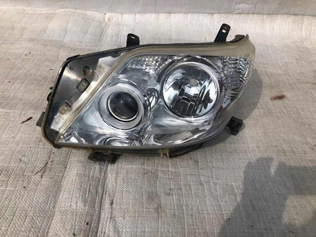 8117060L70 Toyota Reflektor lewy