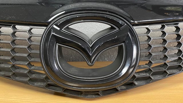 Do koszyka GR1L50712 Mazda Atrapa chłodnicy