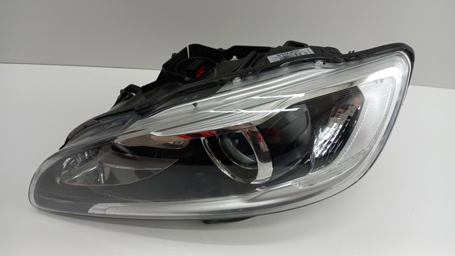 Reflektor lewy 31698818 Volvo