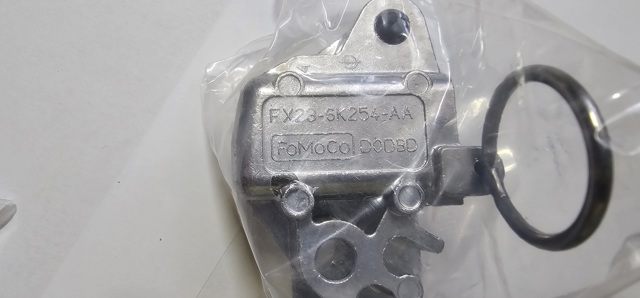 AJ812450 Jaguar Tłumik drgań łańcucha rozrządu, lewy