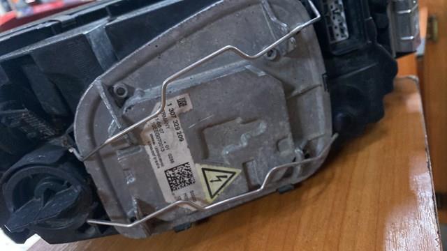 Reflektor lewy 31299585 Volvo