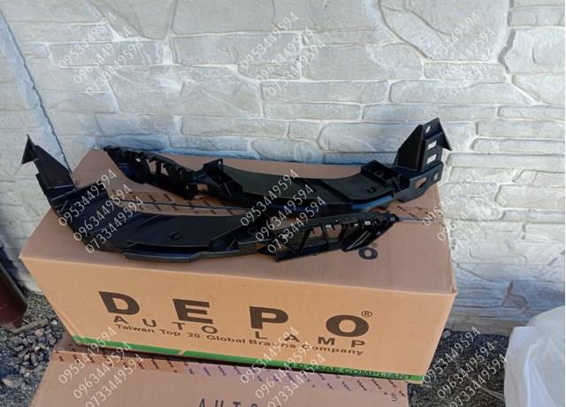 Wsponik (adapter) mocowania reflektora przedniego lewego FPS FP7415241 cena, od 17,21 USD