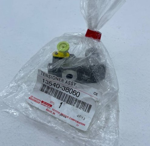 1354038060 Toyota Napinacz łańcucha wałków rozrządu lewy