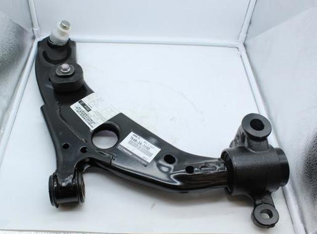 Do koszyka Wahacz zawieszenia przedniego dolny prawy Mazda CX-9  TC