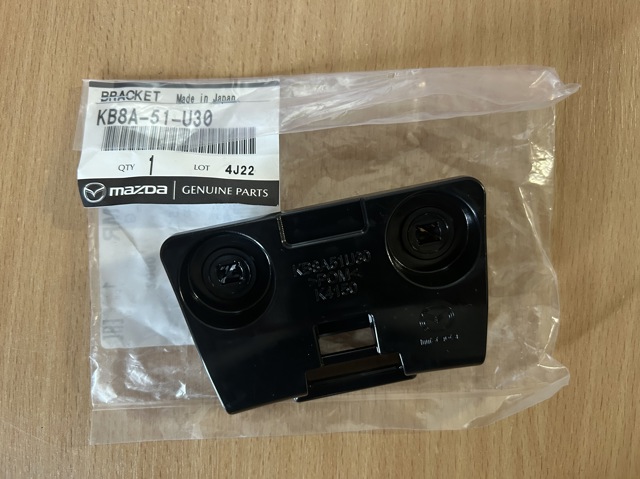 Wspornik błotnika tylnego Mazda KB8A51U30