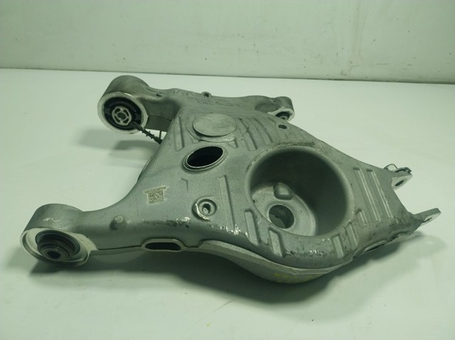 LR098944 Land Rover Wahacz zawieszenia tylnego dolny lewy