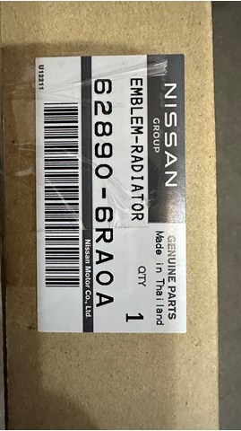 Emblemat na atrapę chłodnicy 628906RA0A Nissan/Infiniti