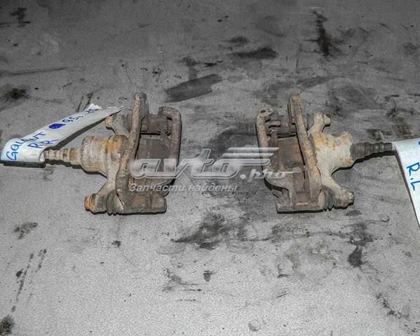 Zacisk hamulcowy tylny lewy Mitsubishi MB950195