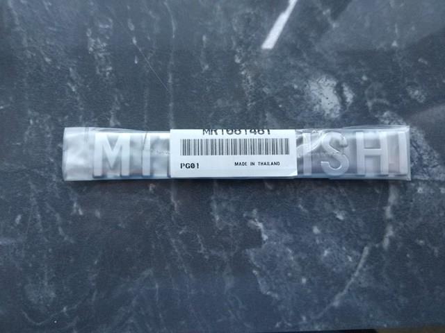 Emblemat na klapę bagaznika (znaczek firmowy) do Mitsubishi Lancer VI CJ, CP