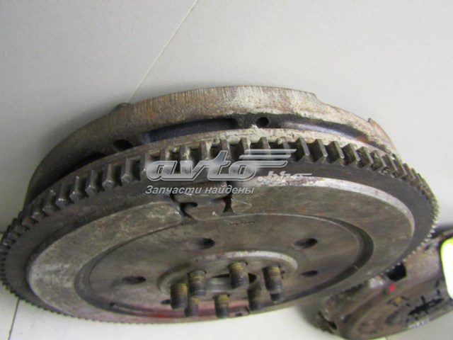 Do koszyka 21211223599 BMW Koło zamachowe silnika