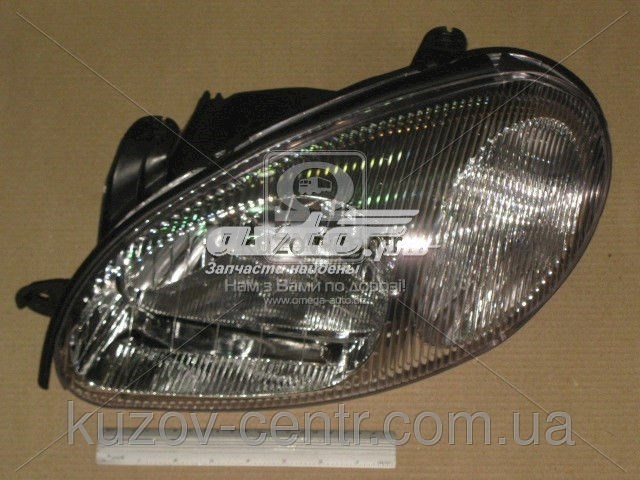 Do koszyka 205896A52B TYC Reflektor lewy