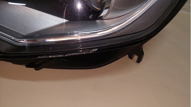 Reflektor lewy VAG 4G0941005C